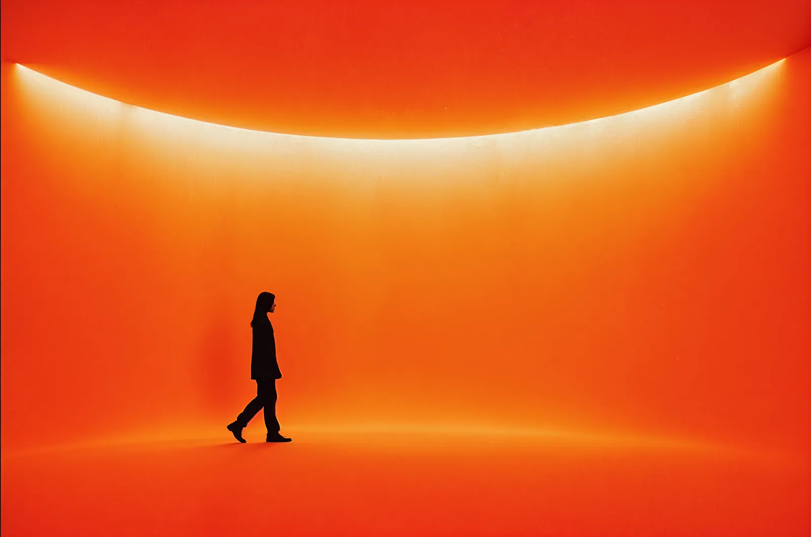 man walking on a sunset background