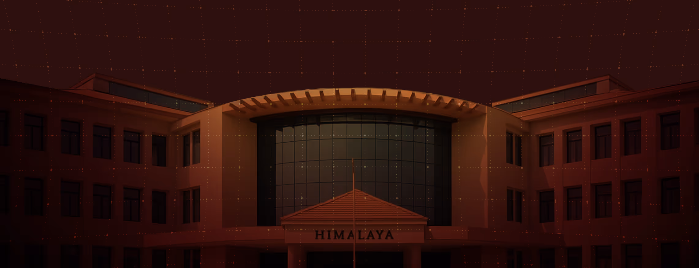 Building facade with large curved glass windows and a sign reading 'HIMALAYA' above the entrance.