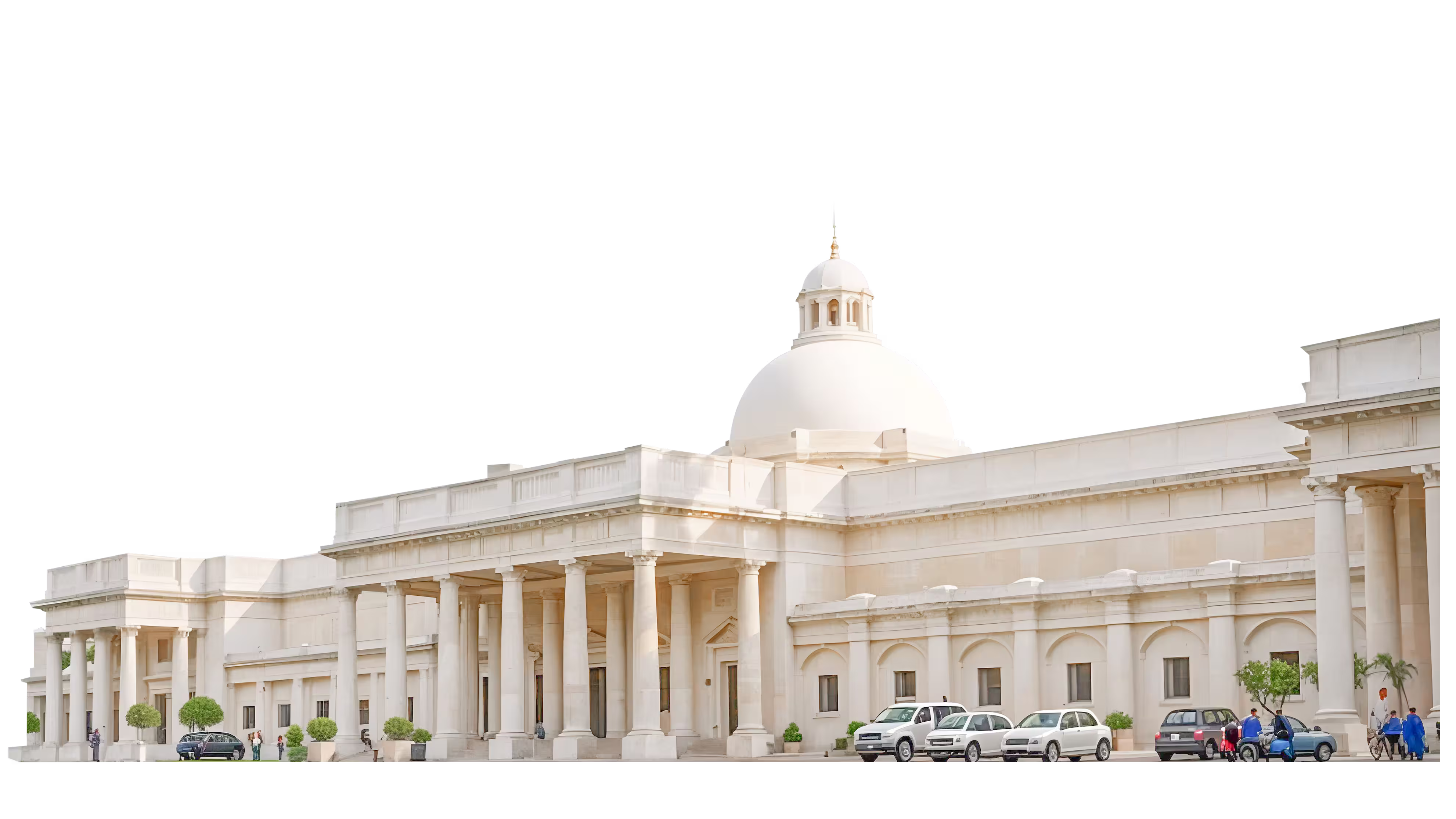 Large white neoclassical building with tall columns and a central dome, with parked cars and people nearby.
